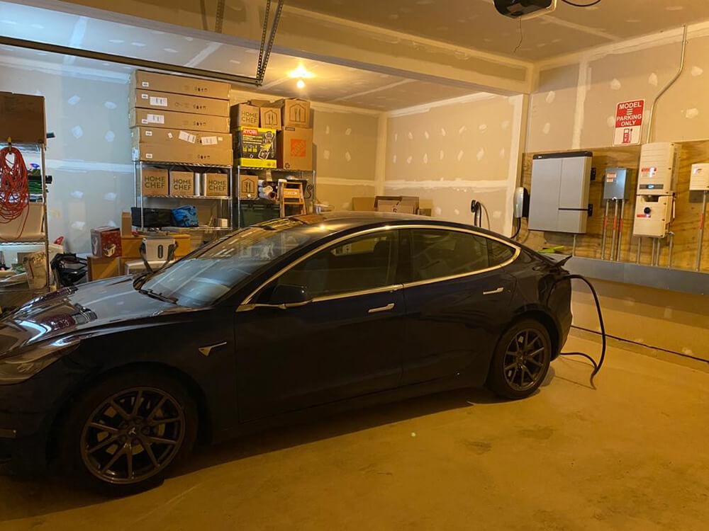 One of our customers charging their Tesla using our EV charging inverter